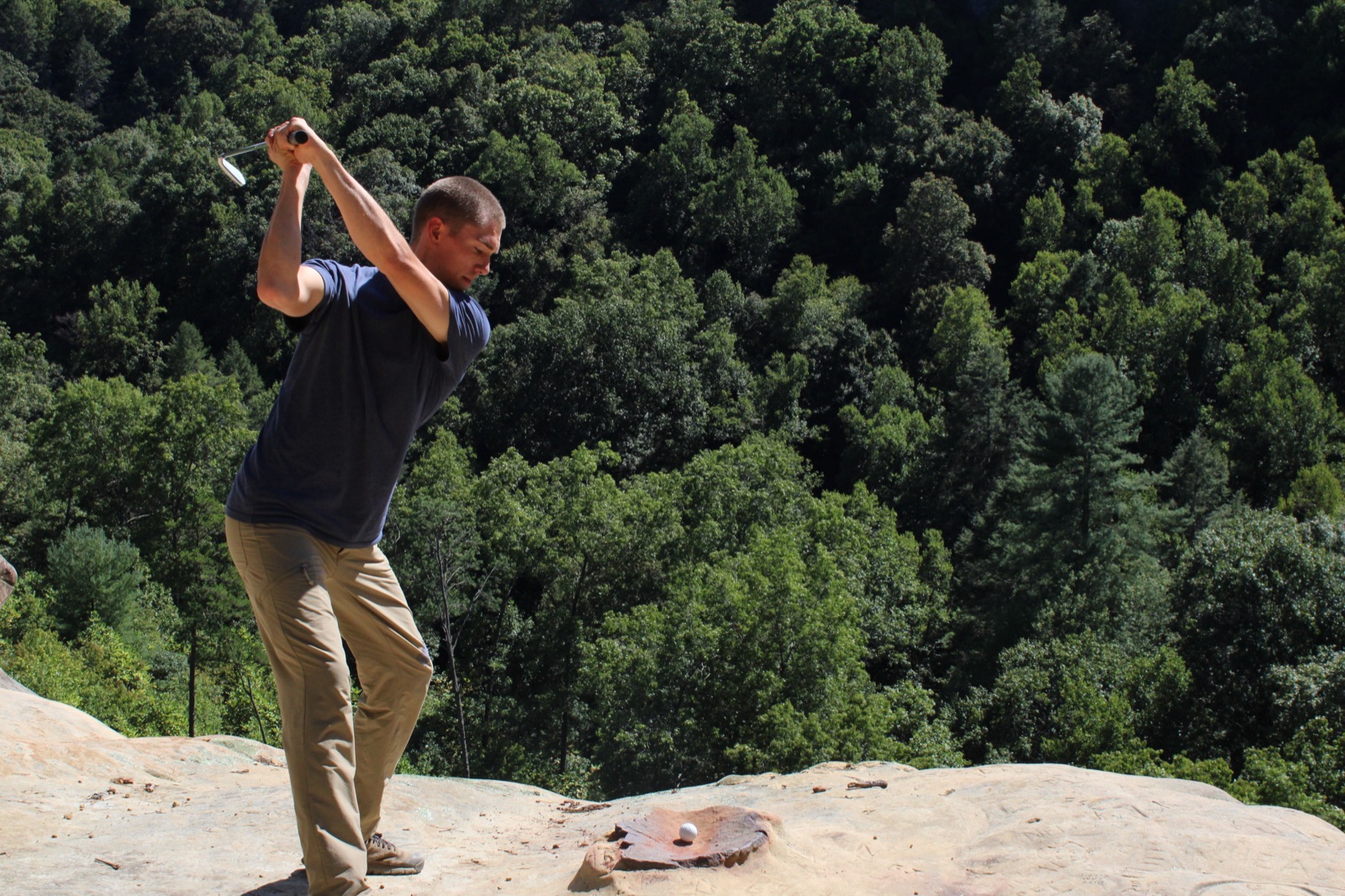 Swing on rock ledge ,  ball went into pocket